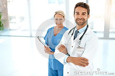 Every doctor needs a nurse they can rely on. Cropped portrait of two happy healthcare practitioners posing together in a Stock Photo