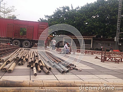 Workers are building a stage frame for the third temple fair on the third day of the third lunar month. In shenzhen xixiang, China Editorial Stock Photo