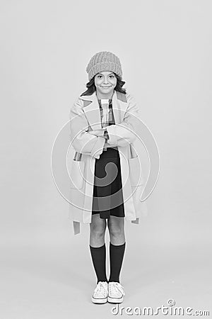 Everyday is fashion show. Little schoolchild in autumn fashion yellow background. Small vogue model with cute fashion Stock Photo