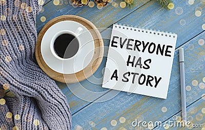 Everyone has a story concept Notepad and cup Stock Photo