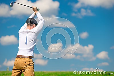 An evil aggressive golfer breaks his golf club after losing Stock Photo