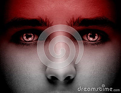 Evil black alien vampire or zombie eyes. Close up shot. Stock Photo