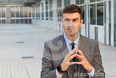 Evil businessman planning a revenge Stock Photo