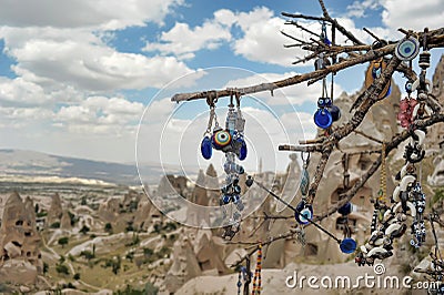 Evil eye in tree behind Love valley in Goreme national park. Cappadocia Stock Photo