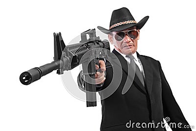 Evil gangster and his gun, isolated on white Stock Photo