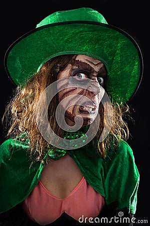 Evil green goblin girl, black background Stock Photo