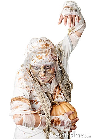 Evil mummy is holding pumpkin Stock Photo