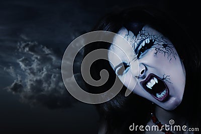 Evil vampire woman beautiful halloween Stock Photo
