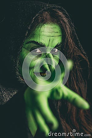 Evil witch casting a curse Stock Photo