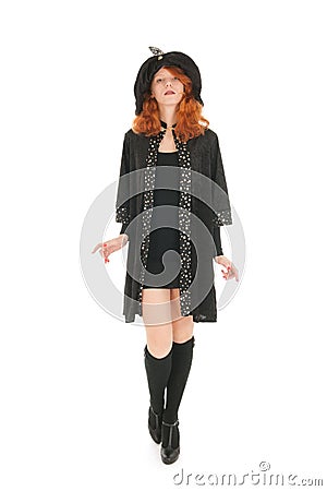 Evil witch walking over white background Stock Photo