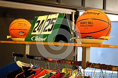 Old basketballs and scoreboards at a vintage market Stock Photo