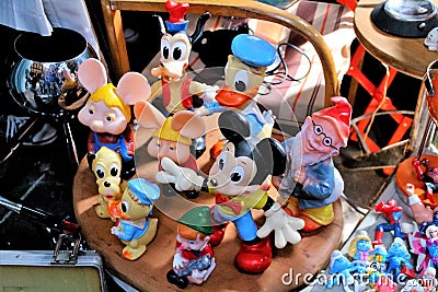 70s dolls Disney characters at a vintage market Editorial Stock Photo