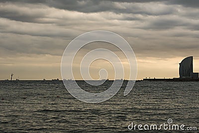 Evocative twilight near the city of Barcelona with a view of the maritime traffic in the distance Stock Photo