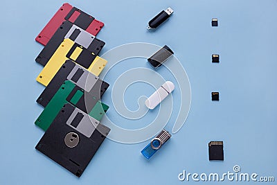 The evolution of digital data storage device. Floppy disks, flash drives and small memory cards Stock Photo