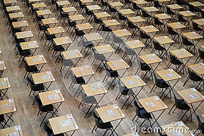 Examination hall set up with chairs and wooden desks. Photographed at Queen Mary, University of London Editorial Stock Photo