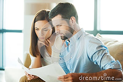 Examining documents together. Stock Photo