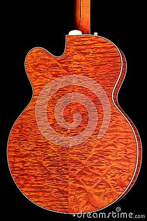 Example of Curly Figured Maple on the Back of a Hollow Body Electric Guitar Stock Photo