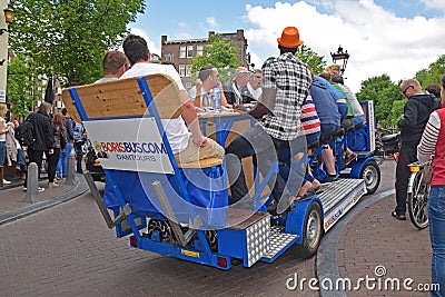 Example of Beer Party Bike in Amsterdam with passengers having a lot of fun together Editorial Stock Photo