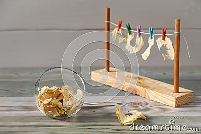 Example of the process of drying apples on a rope Stock Photo