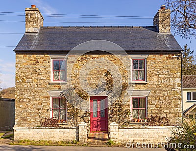 Welsh detached cottage made of Welsh stone. Pembrokeshire, Wales. UK Editorial Stock Photo