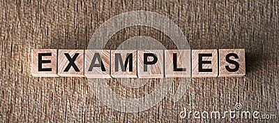 Examples word written on wood cube with brown background Stock Photo