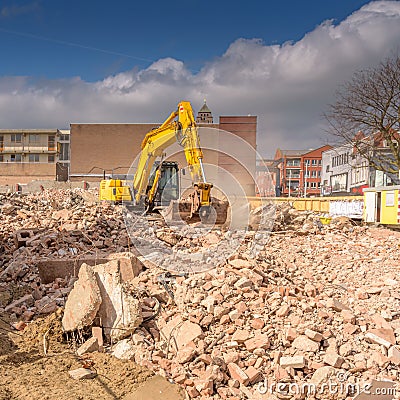 Excavator in construction in city Stock Photo