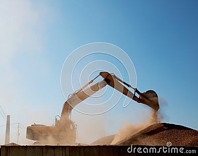 excavator delivers expanded clay Stock Photo