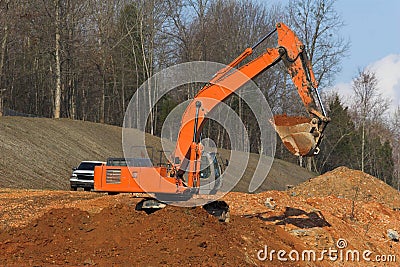 Excavator Digging Stock Photo