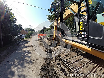 Excavator Digging Deep Stock Photo