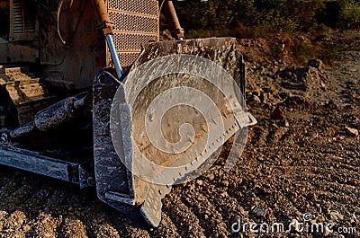 excavator excavates the ground gravel industrial machine sand limestone Stock Photo