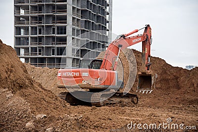 Excavator HITACHI ZAXIS 200 working at construction site Editorial Stock Photo