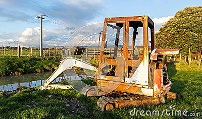 Excavator Left To Die Of Rust Stock Photo