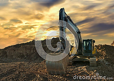 Excavator working on earthmoving at open pit mining on sunset background. Backhoe digs sand and gravel in quarry. Heavy Editorial Stock Photo