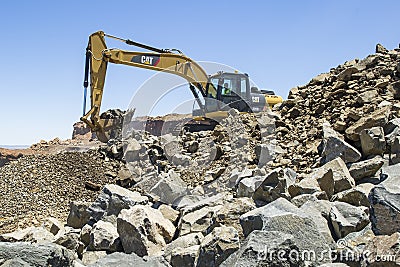 Excavator working in a mine. Editorial Stock Photo