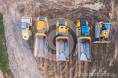 Excavators and dump trucks working on the DrÃ´me River. Deviation of national road 7 at Livron and Loriol Editorial Stock Photo