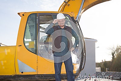 Excavators machine is heavy construction machine used excavate soil at the construction by man Stock Photo