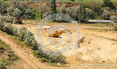 Excavators in the sand pit Stock Photo