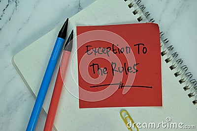 Exception to the Rules write on sticky note isolated on Wooden Table Stock Photo
