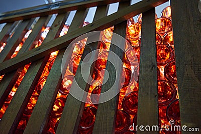 Excerpt wine in glass bottles under special lighting Stock Photo