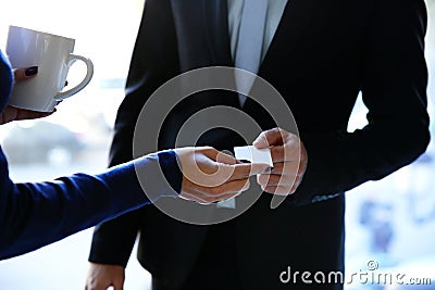 Exchange business card between man and woman Stock Photo