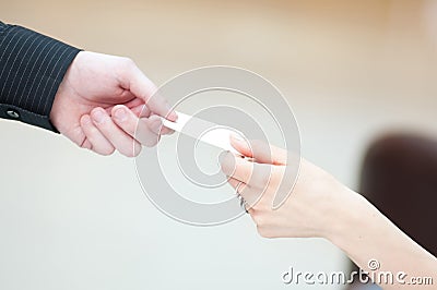 Exchange business card between man and woman. Stock Photo