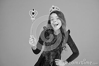 Excited baby. Halloween holiday. Magical transformation. Imagine. Magic trick. Magic stick concept. Cute kid doing magic Stock Photo