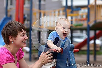 Excited child with mother Stock Photo