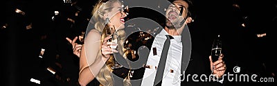 excited couple celebrating together with champagne Stock Photo