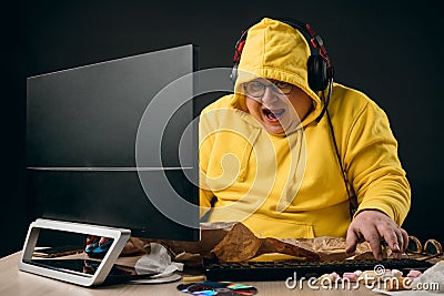 Excited funny plump man surfing the net Stock Photo