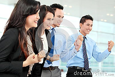 Excited group of business people Stock Photo