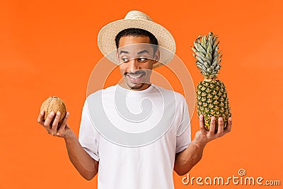 Excited handsome and funny african-american guy, travelling tropical country, relaxing having perfect summertime Stock Photo