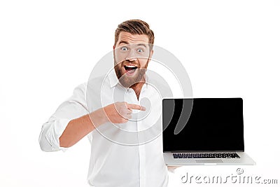 Excited happy bearded man pointing finger Stock Photo