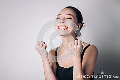 Excited happy woman saying yes I done it raising her fists being surprised not expecting her triumph. Stock Photo