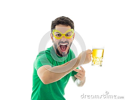 Excited man with weird glasses. Wearing green clothes Stock Photo